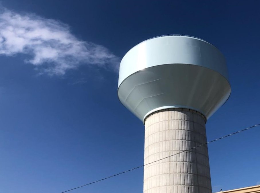 An image of the exterior view of a tall potable water tank.